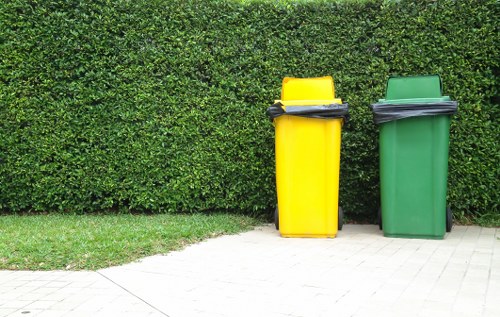 Workers sorting commercial recycling at a depot