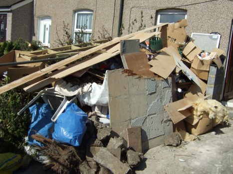 Recycling bins filled with construction waste